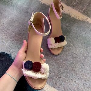 Ivory Soludos sandals with pom poms